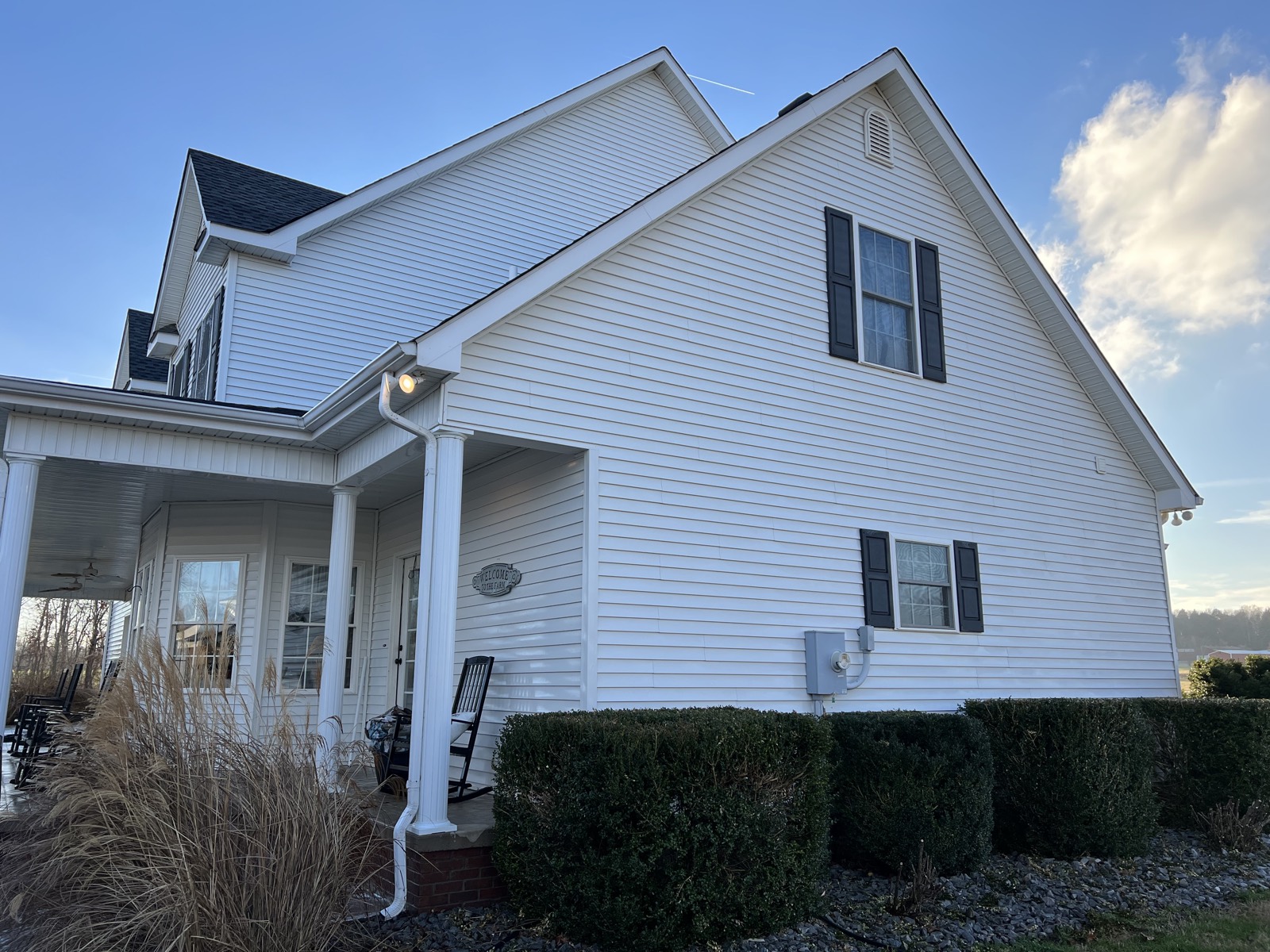 White vinyl siding house after washing