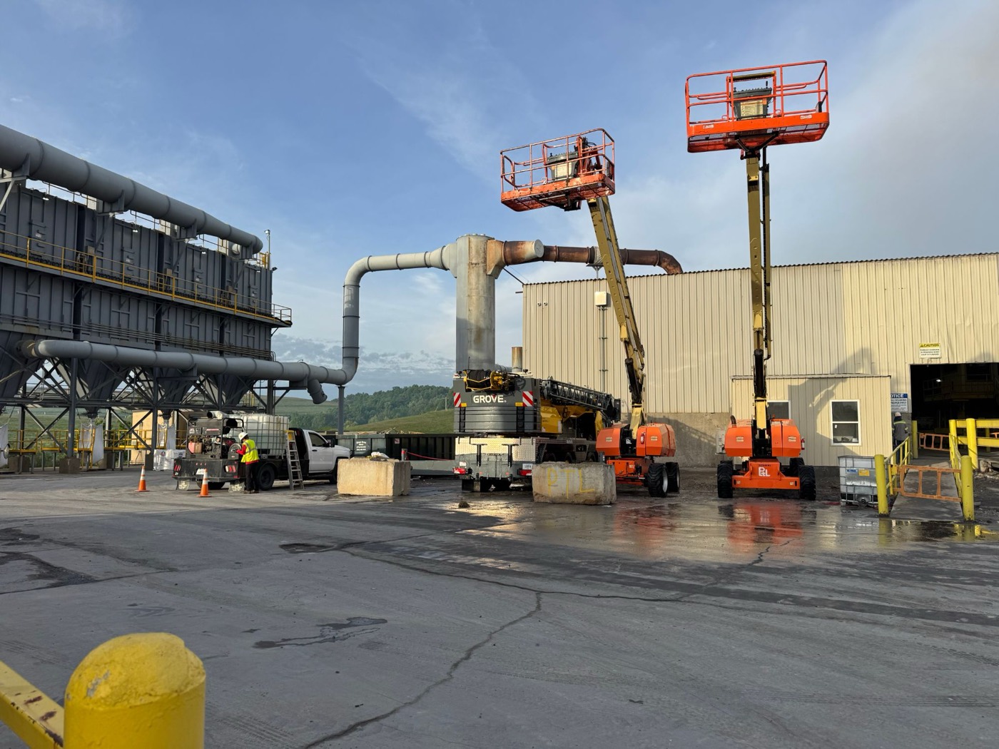 Boom lifts and the Pressures ON service truck set up at an industrial plant
