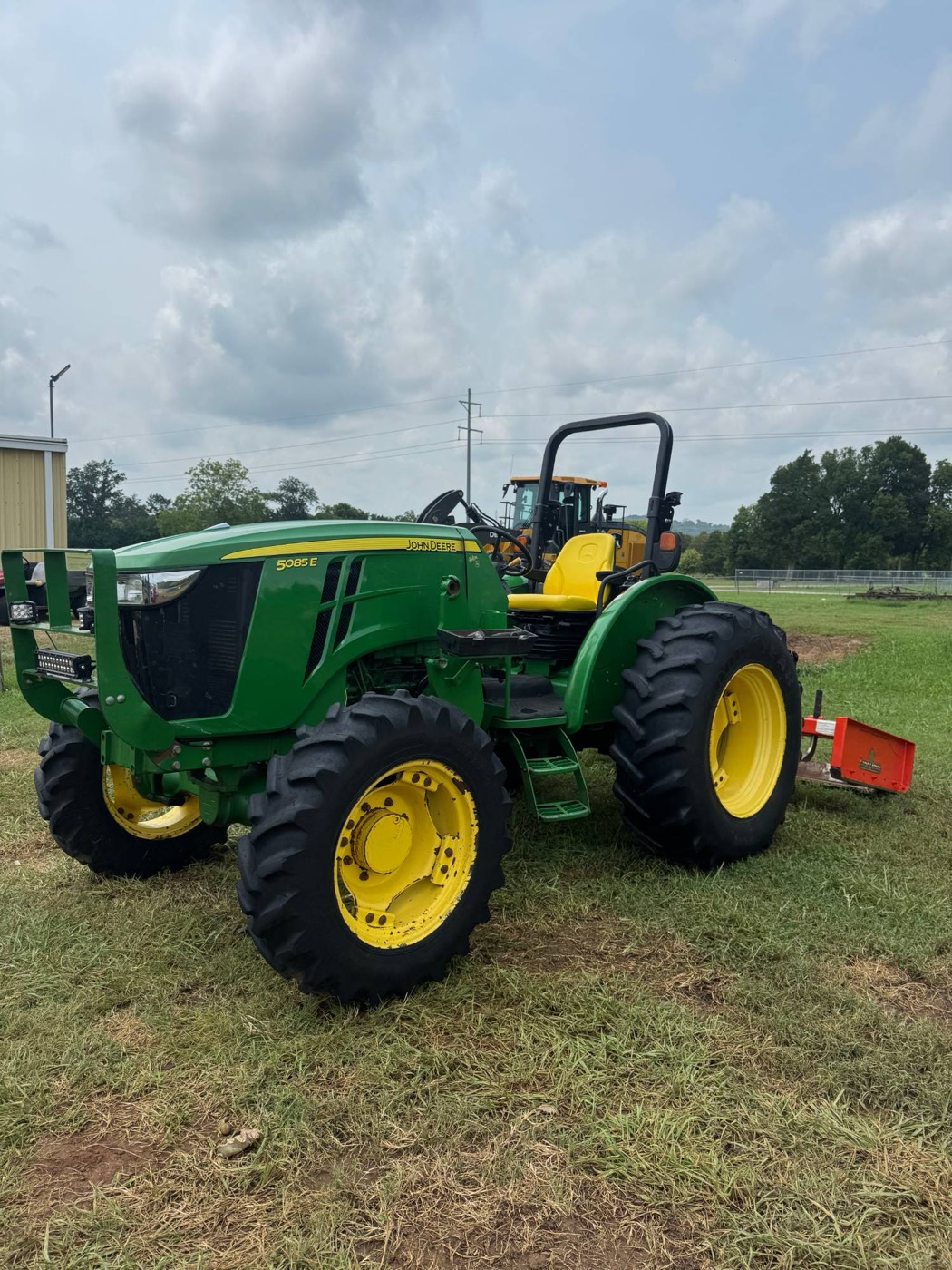 A clean John Deere 5085E tractor